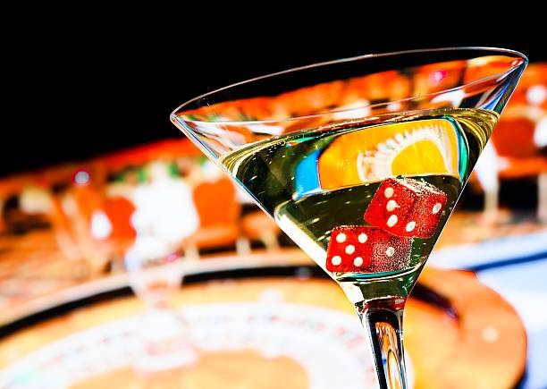 Player on laptop joining a live roulette table at okejp with dealer visible on screen
